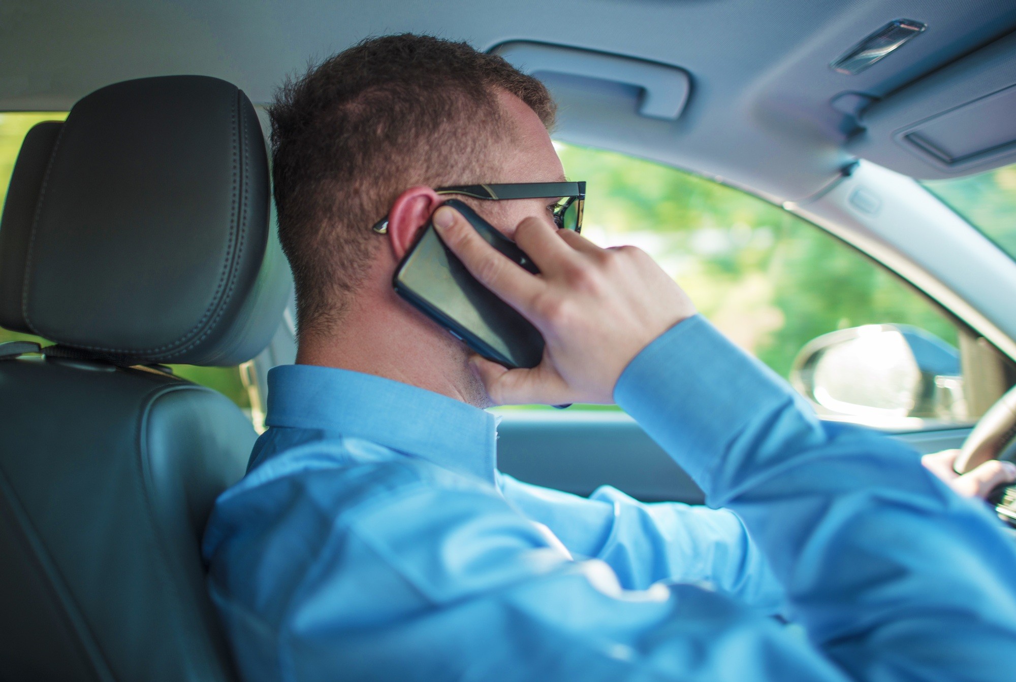 illegal to use your phone while driving in Georgia
